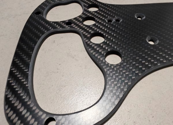 1783390885736358.jpg chamfer edges on carbon fiber sim racing wheel panel parts.jpg