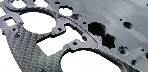 1783390909886014.jpg countersunk holes on carbon fiber sim racing wheel panel.jpg