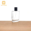Frasco de vidrio de perfume cuadrado plano de 100 ml con tapa negra en relieve