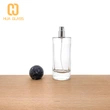 Frasco de perfume redondo de 100 ml con tapas de bola negras