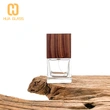 botella de perfume del fabricante 50ml 100ml con la tapa de madera