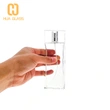 Botella de perfume de vidrio de diseño de cristal transparente transparente de 100 ml