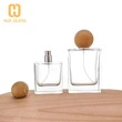 Frasco de perfume de vidrio cuadrado de 30 ml, 50 ml, 100 ml con tapa redonda de madera