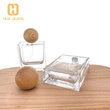 Frasco de perfume de vidrio cuadrado de 30 ml, 50 ml, 100 ml con tapa redonda de madera