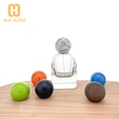 Botella de perfume de vidrio vacía personalizada de 80 ml con tapa de bola de resina