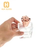 Botella de perfume con tapa de zamak de oro rosa de vidrio pulido a mano rectangular de 50 ml