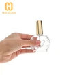 Botella de perfume única de 100 ml con bomba