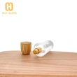 Tapa de madera personalizada 50ml 100ml botella de perfume de vidrio redonda cilíndrica