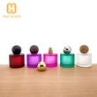 Botella de perfume redonda de 50 ml botella de vidrio de perfume de color personalizado