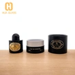 Flacon de parfum rond noir de 50 ml à 100 ml avec boîte à cylindre