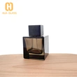 Botella de perfume cuadrada de 100 ml con tapa de madera/tapa de abs