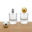 Frasco de perfume redondo de vidrio transparente de lujo de 50 ml con tapa de bola