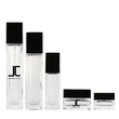 black skincare cosmetic glass bottle set with pump lotion cap