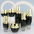 black skincare cosmetic glass bottle set with pump lotion cap