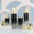 black skincare cosmetic glass bottle set with pump lotion cap