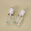 In Stock cosmetic 30ml serum cylinder flat shoulder dropper bottle