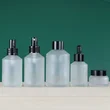 skincare glass pump bottle and glass jar for cosmetic packaging 100ml