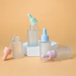 cosmetic face serum glass dropper bottle
