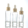 oil dropper bottle  transparent glass bottle  gold lid glass bottle