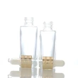 oil dropper bottle  transparent glass bottle  gold lid glass bottle