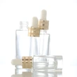 oil dropper bottle  transparent glass bottle  gold lid glass bottle