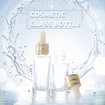 oil dropper bottle  transparent glass bottle  gold lid glass bottle