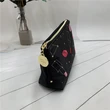 embroidered constellation cosmetic bag