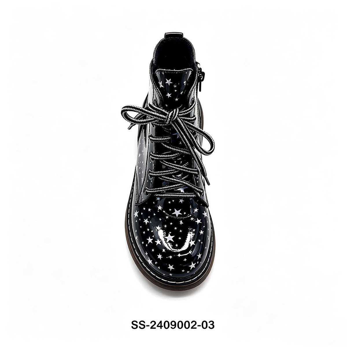 1789795450857392.jpg Top down overhead shot of black star print kids lace up combat boot with tied laces