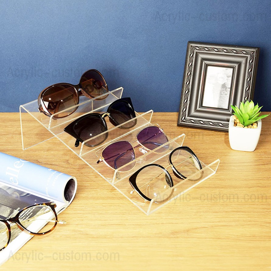 The acrylic display stand is ideal for sunglasses, eyeglasses, and other eyewear collections.