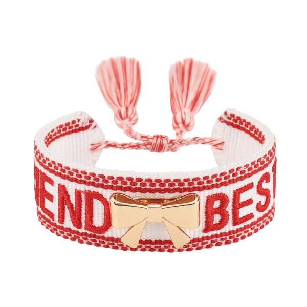 Tassel bracelets featuring embroidered words and decorative charms- rose, butterfly, clover, and bow