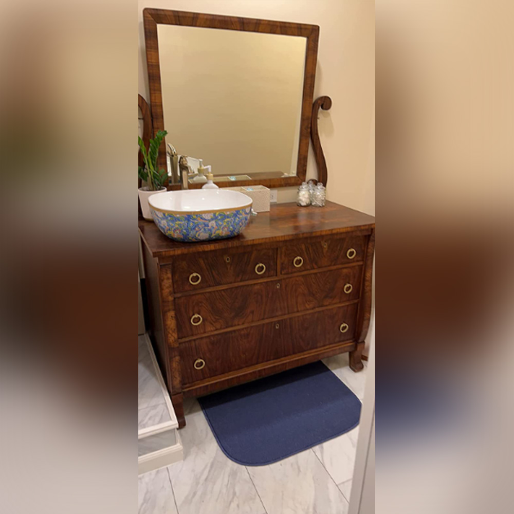 Beautiful brass ring pulls update to the antique vanity.