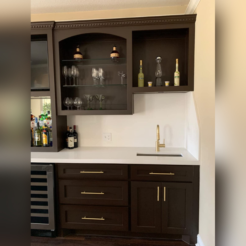 These T-Bar brass pulls are the perfect color to compliment dark built-in cabinets. They are not flimsy at all and are quite durable.