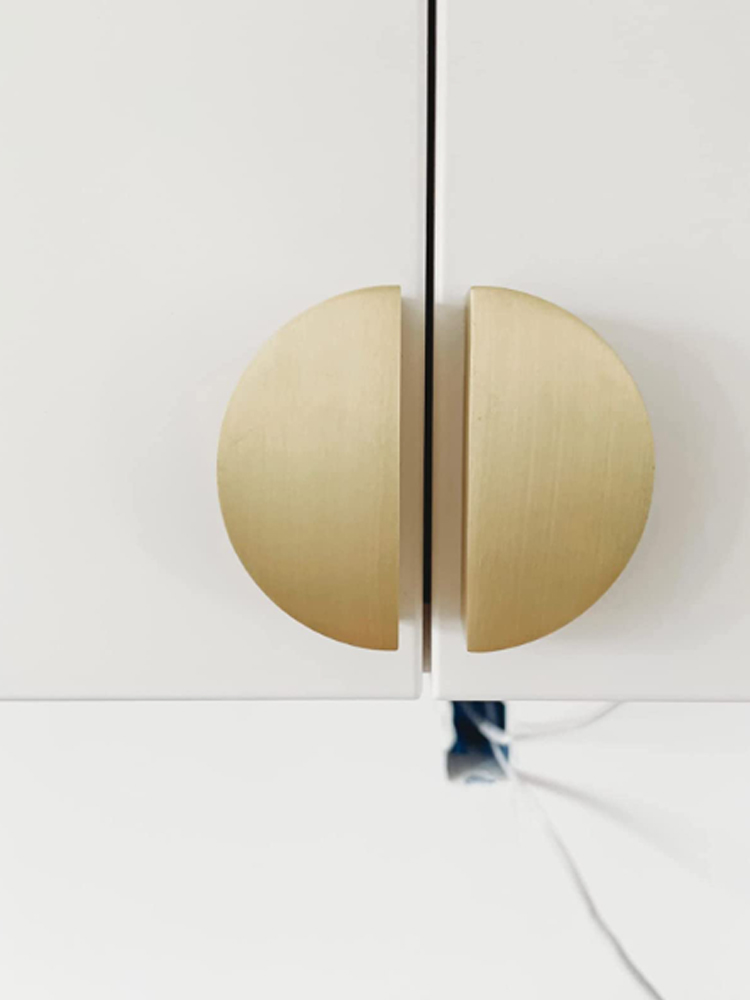 Update your cabinets easily with classical half-moon pulls. They are sleekly modern and super smooth to the touch and quite heavy.