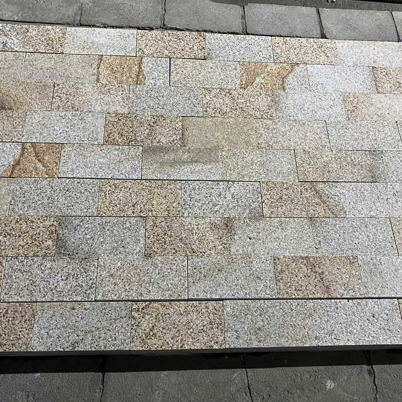 G682 yellow rusty granite cobble stone