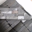 flamed and tumbled black basalt cobble stone