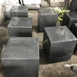 Polished dark grey granite seat