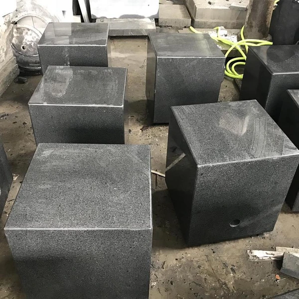 Polished dark grey granite seat
