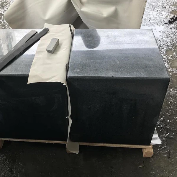 Polished dark grey granite seat