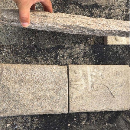 yellow rusty quartzite stone veneer and wall capping