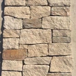 yellow rusty quartzite stone veneer and wall capping