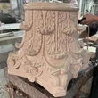 white marble stone pillars caps