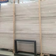 white wooden marble tile and slabs