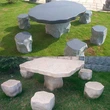 طاولة وكراسي حجرية خارجية