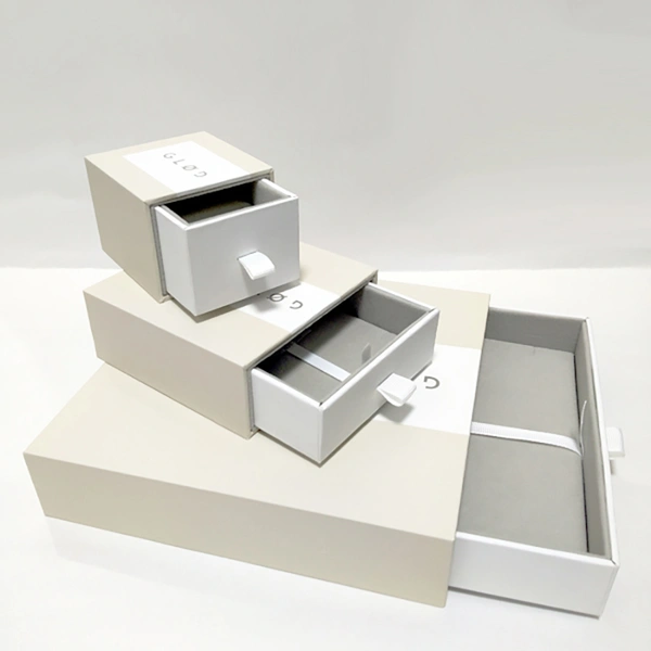 personnaliser une boîte à bijoux, une boîte à boucles d'oreilles, une boîte à tiroirs à petit prix