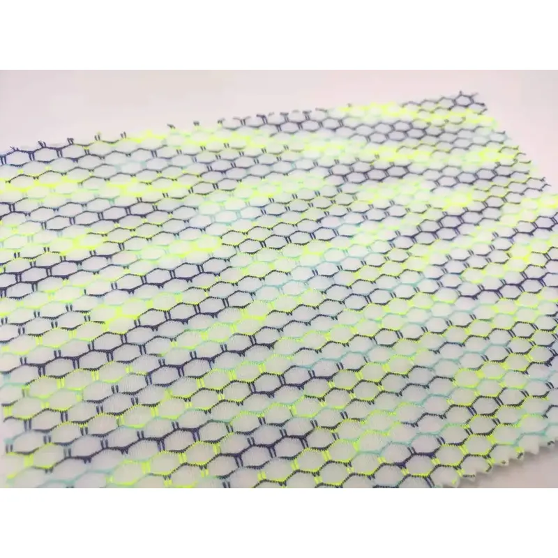 Knitted elastic Honeycomb sports mesh stretching material two-color pointelle fabric