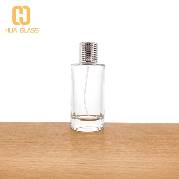 Bouteille ronde en verre de parfum de 100 ml avec bouchon en ruban  