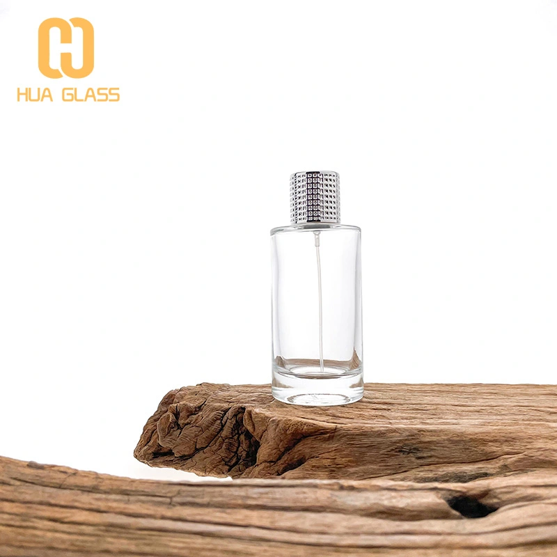 Cilindro redondo botella de vidrio de perfume de 100 ml con tapa plateada  