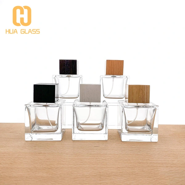 زجاجة عطر 100 مل بالجملة مع غطاء خشبي