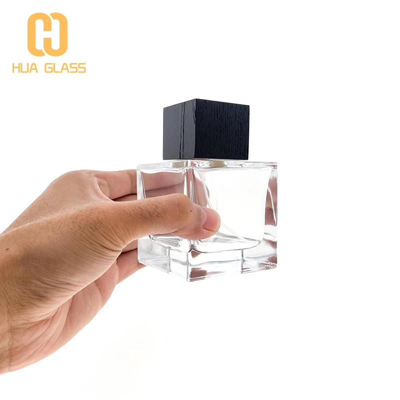 زجاجة عطر 100 مل بالجملة مع غطاء خشبي  