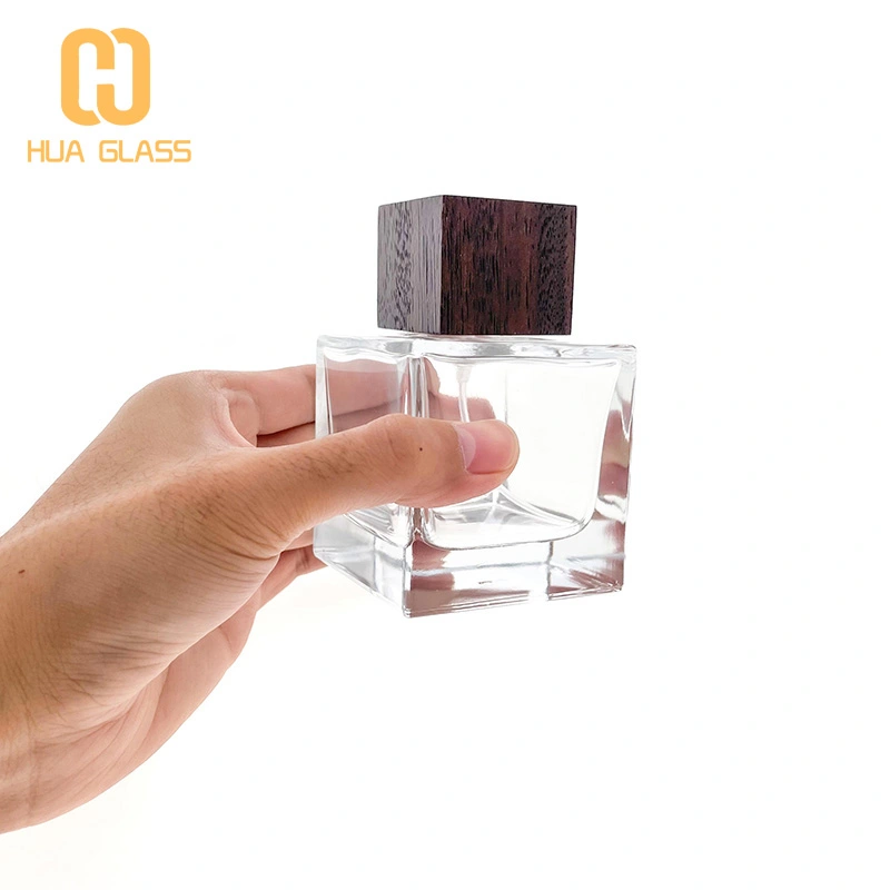 زجاجة عطر 100 مل بالجملة مع غطاء خشبي  